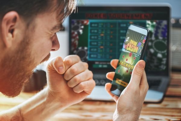 Aplikasi lek jp di layar smartphone menampilkan permainan Prediksi Angka
